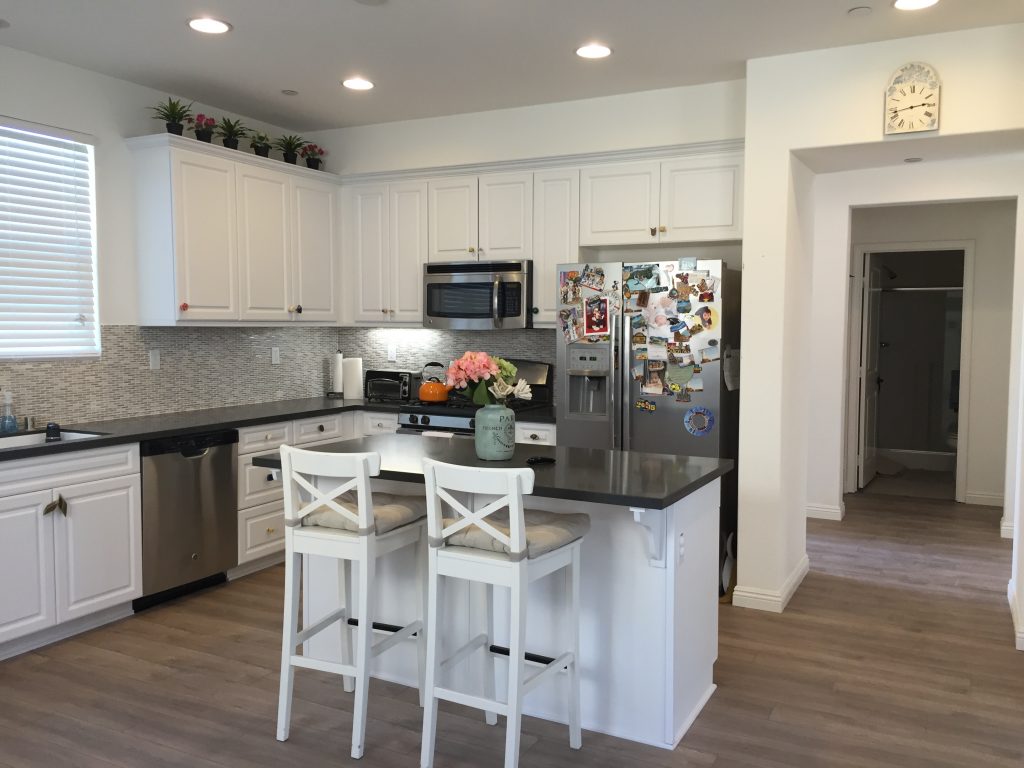 Kitchen Grey Quartz Countertops Mosaic Backsplash And Wood Floor